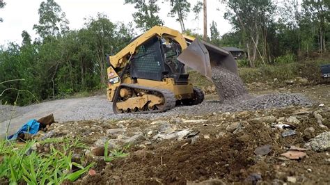 skid steer moving gravel|Cat 259d skid steer moving gravel fast .